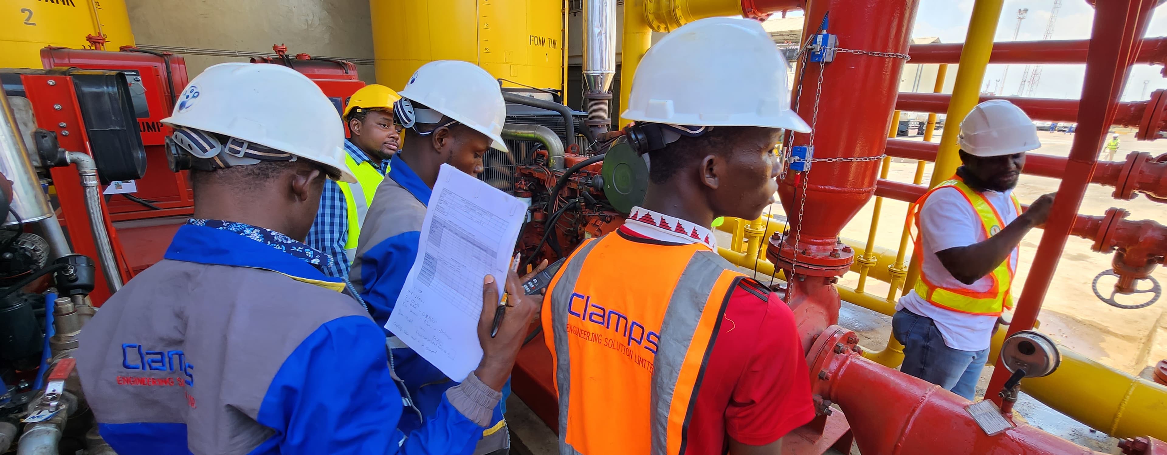 Clamps Engineering team conducting site inspection on industrial pipework